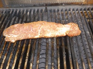 On the grill, don't overcook it! The pork should be slightly pink in the center- it's not your Grandmother's pork!